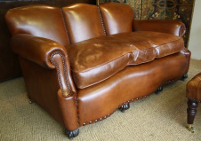 Edwardian Hump Backed Leather Sofa